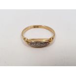 18ct gold and five-stone diamond ring, the stones gypsy-set in rubover setting and graduated,