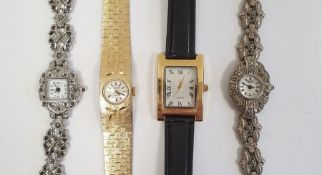 Two lady's white metal and marcasite dress watches, a lady's Avia gilt metal wristwatch with