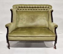 Late 19th century two-seat sofa and similar armchair in green wingback upholstery, on cabriole front