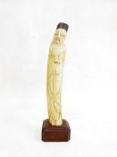 Antique Chinese ivory tusk carving of Zhongli Quan, one of the eight Taoist immortals carrying a