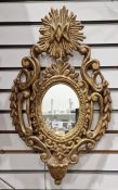 Oval mirror in moulded painted frame
