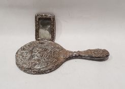 Silver-backed dressing table hand mirror with cherub and a small photograph frame (2)