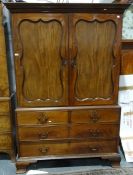 George III-style mahogany wardrobe, the moulded cornice with Green key applied moulding, above two