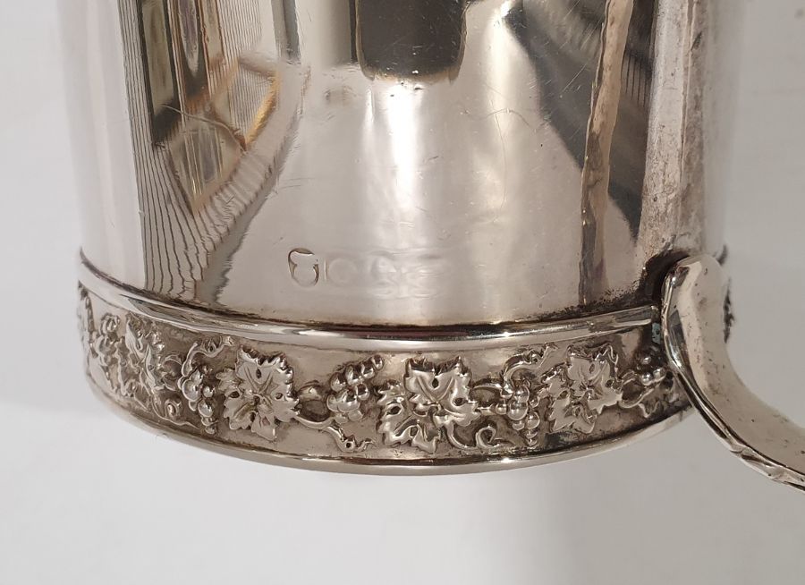 Georgian silver mug with grape and vine band decoration to the rim, acanthus handle, crested body, - Image 3 of 6