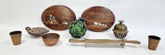 Eastern hardwood oval plaques with inlaid decoration, a witch's ball, two Eastern brass beakers, a