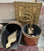 Brass firescreen, a copper coal helmet, a pair of bellows, a companion set and a copper bucket