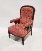 Victorian mahogany armchair with upholstered seat, back and armrests, on turned front legs to