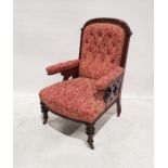 Victorian mahogany armchair with upholstered seat, back and armrests, on turned front legs to