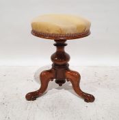 Victorian beech circular piano stool, on turned supports to three ogee legs