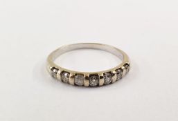 18K white gold and diamond ring set seven diamonds, channel set Condition ReportThe size is 'S'  one