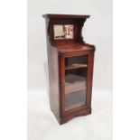 19th century mahogany mirrored back cabinet with single glazed door enclosing shelves, to plinth,