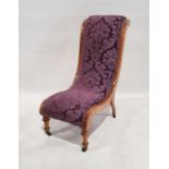 Late Victorian walnut-framed salon chair with upholstered seat, turned front legs to black china