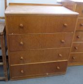 Mid 20th century modern oak chest of five long drawers, on plinth base, labelled to interior '