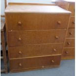 Mid 20th century modern oak chest of five long drawers, on plinth base, labelled to interior '