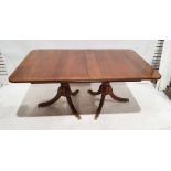 20th century Regency-style dining table, the rectangular top with rounded corners, moulded edge,