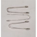 Three silver sugar tongs to include George III sugar nips, London 1807 by Samuel Godbehere, Edward