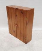 Pine two-door cupboard, 75cm x 61cm x 20cm Condition ReportCupboard has two shelves, see photo.