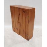 Pine two-door cupboard, 75cm x 61cm x 20cm Condition ReportCupboard has two shelves, see photo.