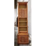 20th century narrow yew bookcase with moulded cornice above open shelves and cupboard doors, two