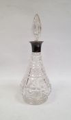 Cut glass baluster-shaped decanter with silver collar and glass stopper