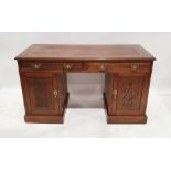 Late 19th/early 20th century oak desk, the leather