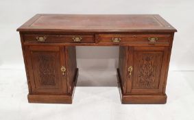 Late 19th/early 20th century oak desk, the leather