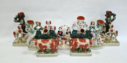 Staffordshire flatback highland figure clock group, a spaniel group, three other antique