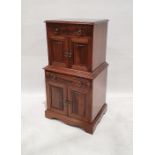 20th century cabinet with lift-top above two cupboard doors, single drawer and two cupboard doors