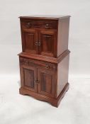 20th century cabinet with lift-top above two cupboard doors, single drawer and two cupboard doors