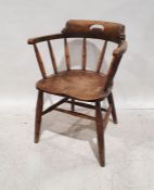 Vintage elm-seated spindleback captain's-type chair on turned and ring supports