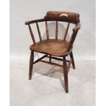 Vintage elm-seated spindleback captain's-type chair on turned and ring supports