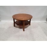 20th century circular two-tier coffee table, 51cm x 86cm diameter, a melamine-topped coffee table on