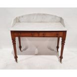 Early Victorian washstand, the three-quarter white marble galleried top above two drawers, on turned