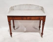 Early Victorian washstand, the three-quarter white marble galleried top above two drawers, on turned