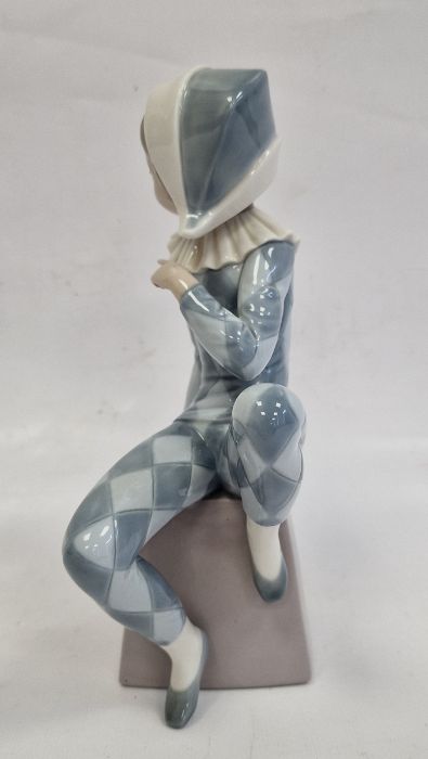 Lladro figure of boy wearing harlequin suit seated on box initialled B, 20.5cm high - Image 2 of 6