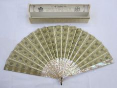 **** WITHDRAWN**** A late 19th Century fan embroidered with silver and gold sequins, mounted on