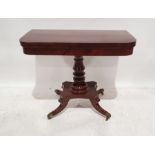 Regency-style mahogany tea table, the rectangular top with rounded front corners and banded, on a