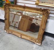 Rectangular mirror in moulded gilt-effect frame, 64cm x 84cm