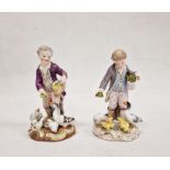 19th century Meissen figure of boy feeding ducks, on gilt scroll decorated circular base, 12cm