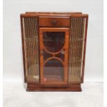 20th century walnut display cabinet in the Art Deco manner, single drawer above glazed door, glass