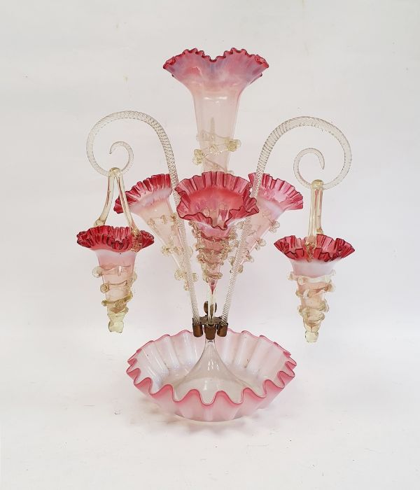 Victorian cranberry and clear frilled epergne with central tapering vase, three further smaller
