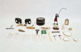 Three trays of collectables viz. , jewellery, corkscrews, elephants, ornaments, cocktail sticks, etc