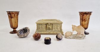 Polished stone eggs, a brass casket and two glass vases of faceted form