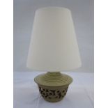 20th century lamp with studio pottery-style pierced base and cream shade together with a 20th