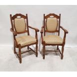 Pair of modern oak framed armchairs with yellow upholstered seats and backs, on turned front legs (