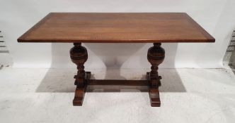 20th century oak dining table on cup and cover turned end supports