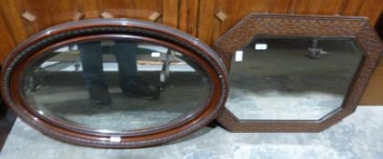 20th century mirror in elongated octagonal frame and one further mirror (2)