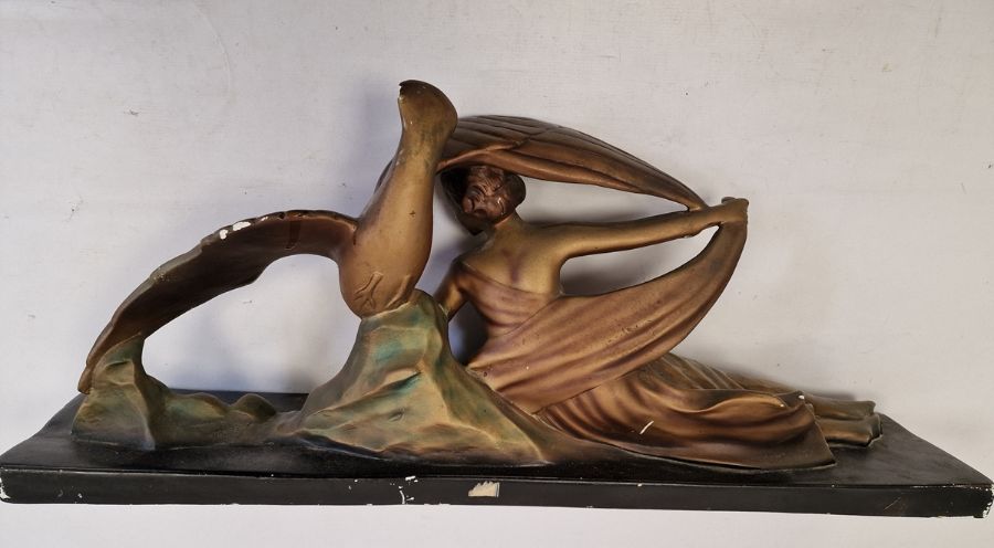 Art Deco large bronzed-effect plaster figure of girl reclining the side with eagle on rock, on black - Image 3 of 4