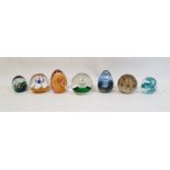 Collection of glass paperweights to include a Tyne Valley glass paperweight with green and blue