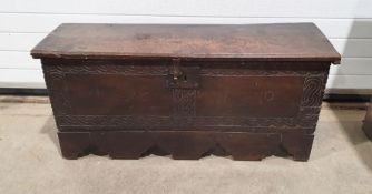 Possibly 18th century or earlier sword chest, the top marked 'TH' with stylised rose decoration,